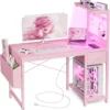 40-inch Gaming Desk with Power Outlet, LED Lights, Reversible Shelves, and Storage Drawer for Home Office