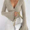 Ladies' autumn and winter apricot-colored V-neck long-sleeved slim striped T-shirt knitted sweater, sexy knitted top